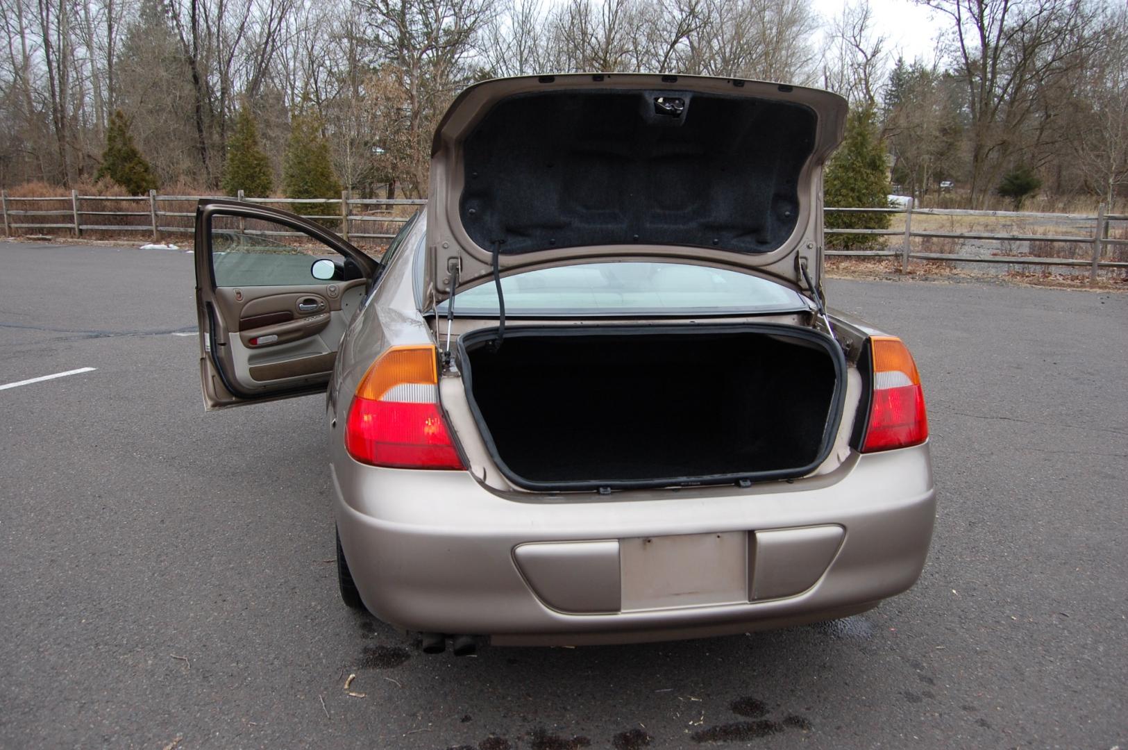 2000 Tan /Tan Leather Chrysler 300M (2C3HE66G8YH) with an 3.5 liter V6 engine, Automatic transmission, located at 6528 Lower York Road, New Hope, PA, 18938, (215) 862-9555, 40.358707, -74.977882 - Here for sale is a good running 2000 Chrysler 300M. Under the hood is a strong running 3.5 liter V6 which puts power to the font wheels via a smooth shifting automatic transmission. Features include; Tan leather interior 2 keys, 2 remotes, wood trim, cruise control, tilt steering wheel, AC, power - Photo#21